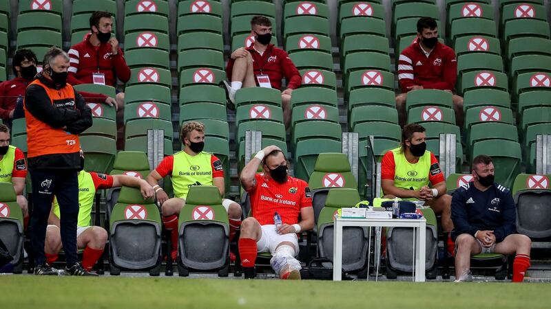 Munster’s RG Snyman watches from the bench after suffering  a knee injury early in the Guinness Pro 14 game against Leinster at the  Aviva Stadium. Photograph: Dan Sheridan/Inpho