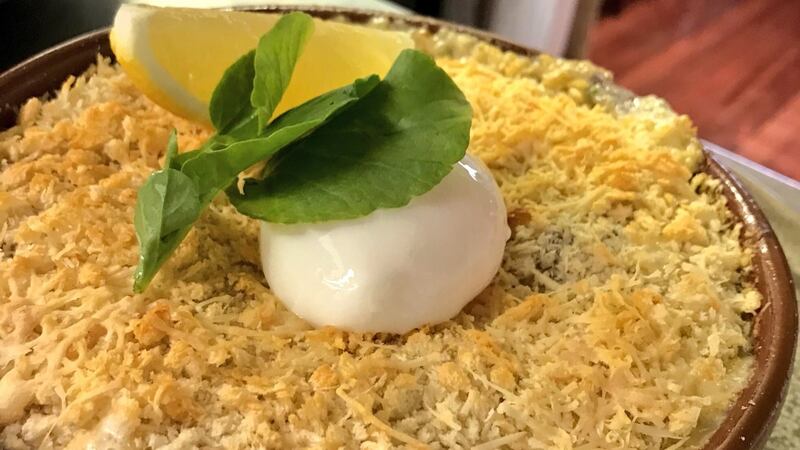 Chef Wade Murphy’s 1826 Adare fish pie is served with a poached egg on top