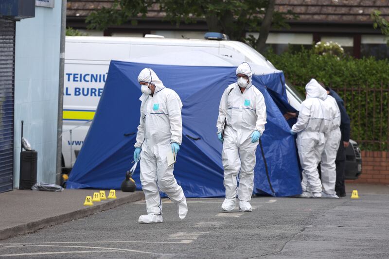 Garda Technical Bureau officers at the scene on Railway Street, Balbriggan, earlier this week after Mircea Rostas was struck by a car. Photograph: Colin Keegan/Collins 
