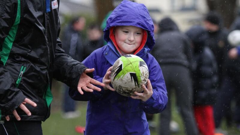 Tag rugby with the Terenure Tigers, part of Terenure College Rugby Club in Dublin. Photograph: Peter Thursfield