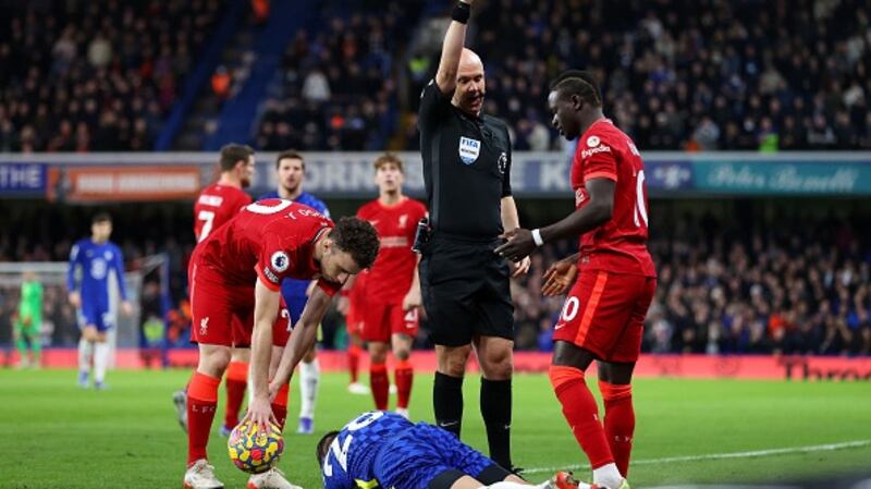 Sadio Mané saw yellow early on after catching César Azpilicueta with his arm. Photograph: Catherine Ivill/Getty Images