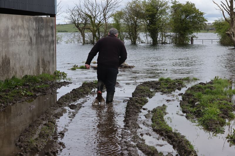 A waterlogged farmyard from the rising waters of Lough Funshinagh.  Photograph: Alan Betson/The Irish Times

