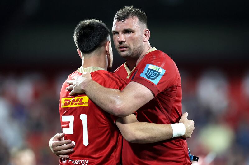 Munster's Tadhg Beirne celebrates with Conor Murray after the victory over Benetton at Virgin Media Park, Cork. Photograph: Laszlo Geczo/Inpho 