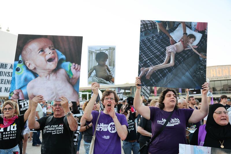 Israeli and Arab activists take part in a rally calling for an end to the war on Gaza and the famine stemming from it, in Tel Aviv, Israel, on Tuesday. Photograph: EPA