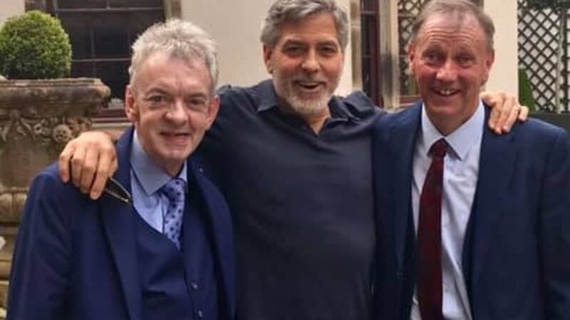 Andy Ring, George Clooney and Seamus Clooney in Ballyfin, Co Laois. Photograph:  Facebook/Abbeyleix Tourism and Marketing Group