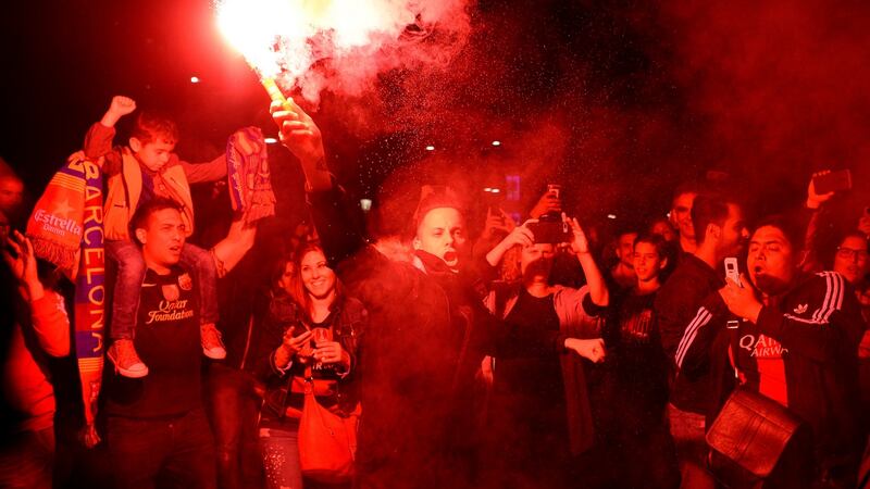 Barcelona fans celebrate in the city. Photo: Josep Lago/Getty Images