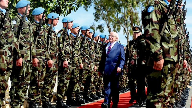 President Michael D Higgins inspecting a guard of honour by troops with the United Nations Interim Force in Lebanon. Photograph: Maxwell’s