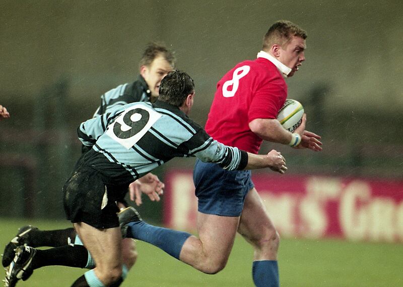 Leinster's Victor Costello breaks through the Cardiff defence during the European Cup semi-final on December 30, 1995. Photograph: Billy Stickland/Inpho