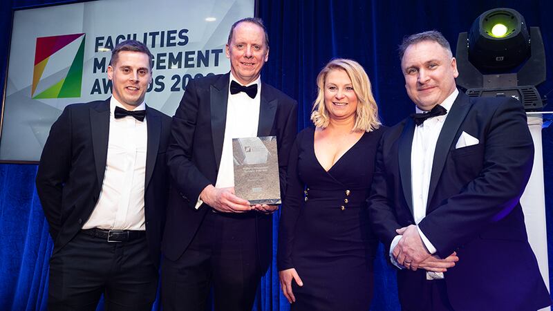 Noel Hennessy, Senior Operations Manager, Synergy Security Solutions, presents the Property Management Company of the Year Award to the Aramark Property team.