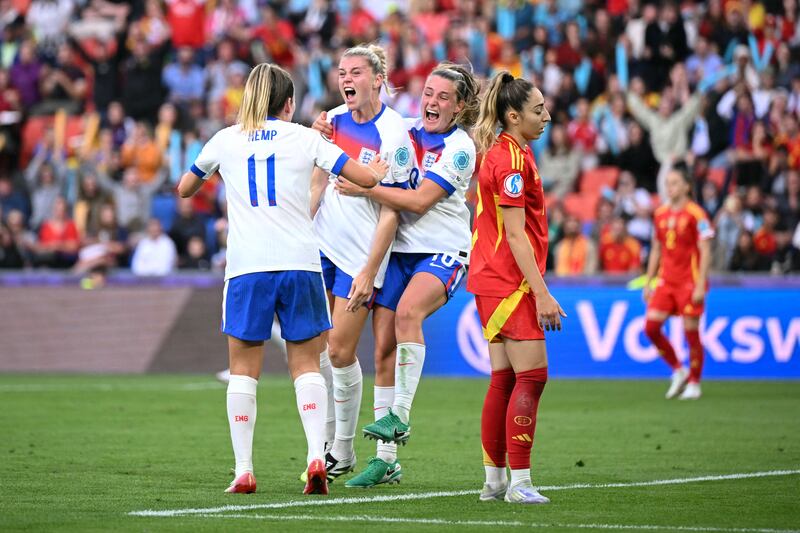 England's forward Alessia Russo celebrates after scoring their first goal. Photograph: Sebastien Bozon/Getty