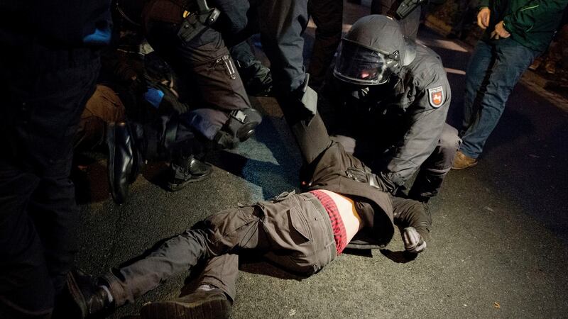 Police try to clear a street that is blocked by demonstrators near the congress centre where the party convention of the Alternative for Germany, AfD, is held in Hannover. Photograph: Hauke Christian Dittrich/dpa via AP