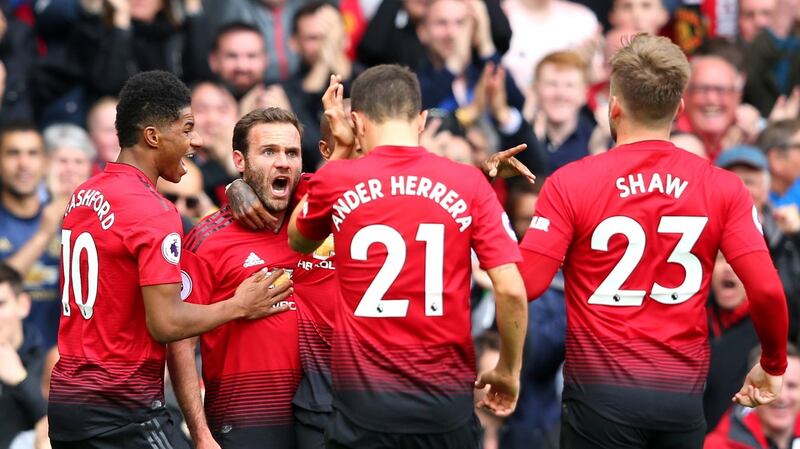 Juan Mata celebrates scoring Manchester United’s opener against Chelsea. Photograph: Alex Livesey/Getty
