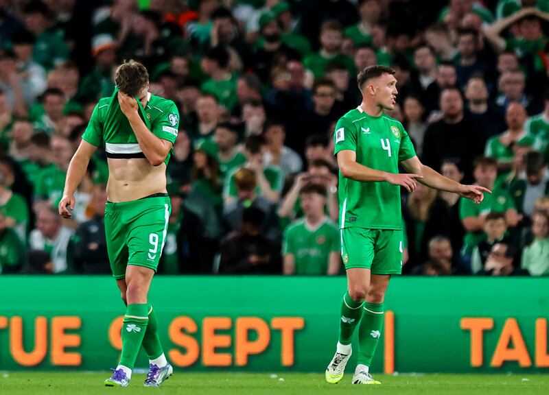 Ireland's Evan Ferguson and Dara O'Shea (right) after Hungary scored their second goal in Saturday's World Cup qualifier at the Aviva Stadium. Photograph: Ryan Byrne/Inpho