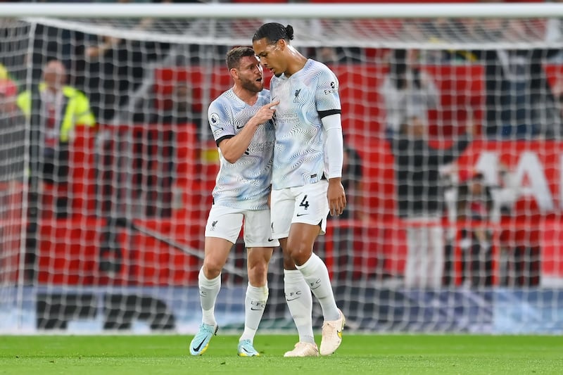 James Milner has words with Virgil van Dijk after Liverpool concede their first goal at Old Trafford. Photograph: Michael Regan/Getty Images