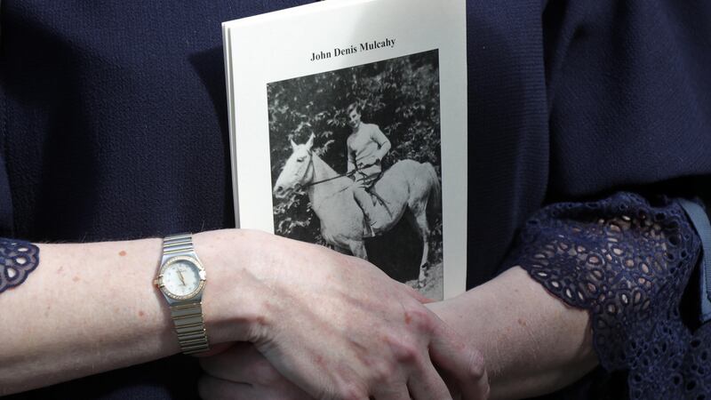 A woman holds the mass booklet pictured this morning at the funeral of publisher, John Mulcahy at St. Mary’s Church, Haddington Road, Dublin. Photograph: Colin Keegan/Collins Dublin.