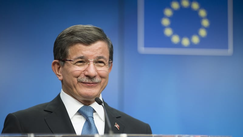 Ahmet Davutoglu, Turkey’s prime minister, smiles during a news conference following a meeting of EU leaders in Brussels on Monday. Photograph: Jasper Juinen/Bloomberg