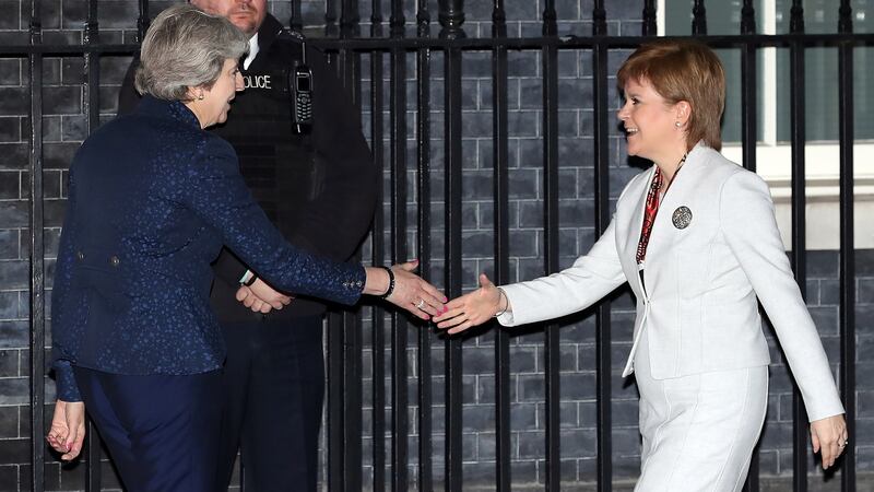 Theresa May and Nicola Sturgeon meer outside Downing Street in 2017. Photograph: Dan Kitwood/Getty