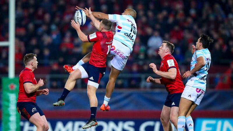 Munster’s Andrew Conway competes for the ball  with Racing 92’s Simon Zebo of Racing 92 during the Heineken Champions Cup game  at Thomond park. Photograph: Tommy Dickson/Inpho