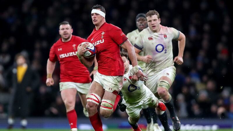Wales’ Aaron Shingler gets away from England’s Danny Care  during the 12-6 defeat at Twickenham. Photograph: James Crombie/Inpho