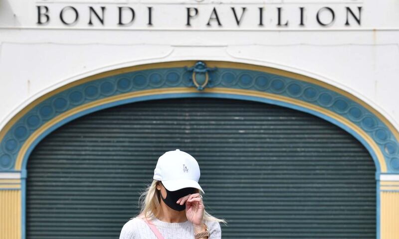 Coronavirus clusters: a Bondi resident leaves a Covid-19 testing clinic in Sydney. Photograph: Dean Lewins/EPA