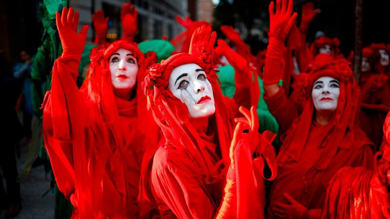 Protesters in costume gather at Marble Arch in London. Photo: Tolga Akmen/AFP
