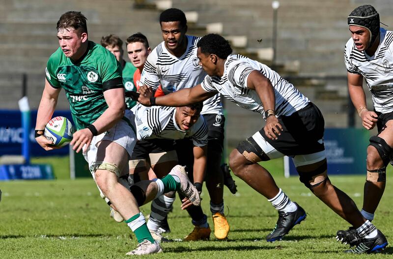 Ireland's Diarmaid Mangan makes a break during the game against Fiji. Photograph: Darren Stewart/Inpho/SteveHaagSports