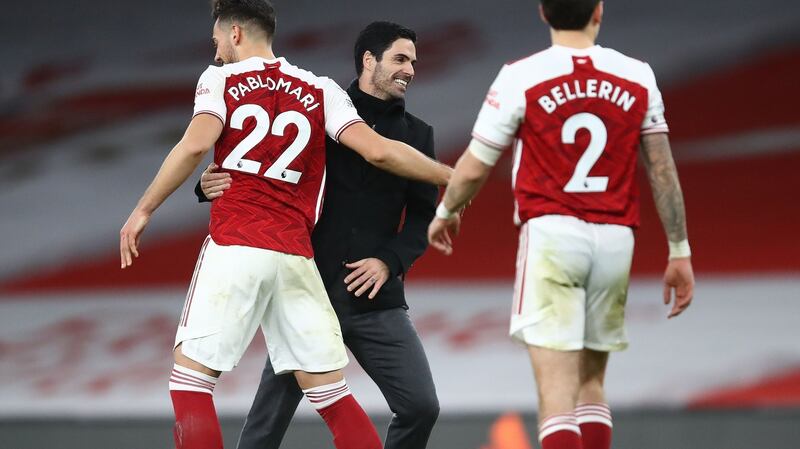 Arsenal’s Spanish manager Mikel Arteta celebrates with his team after beating Chelsea. Photograph: Getty Images