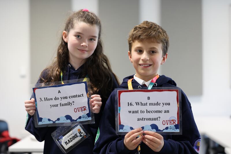 Nadine Hoban (10), Sacred Heart School Killinarden, and Nathanael Pituc (11), Gardiner Street Primary School, chat with the International Space Station.  Photograph: Nick Bradshaw