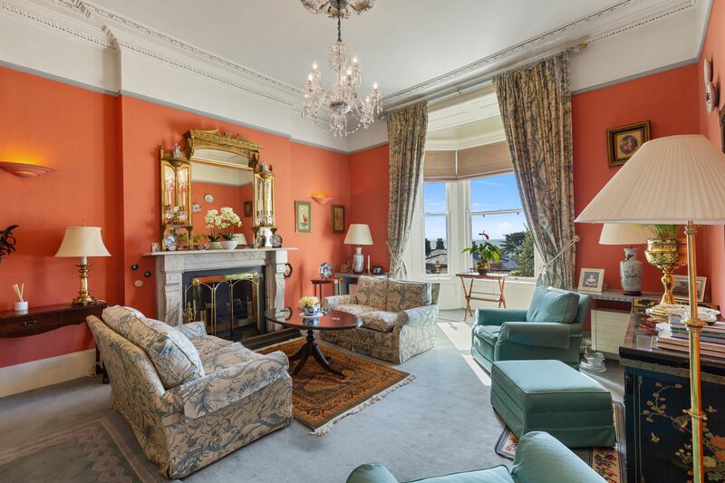 Drawingroom has a fine bay window, tall ceilings and a period fireplace