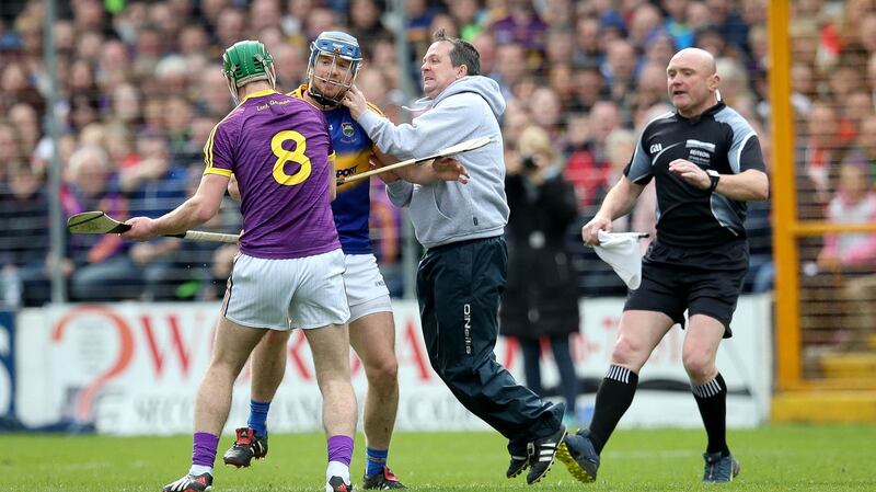 Davy Fitzgerald gets physical. Photograph: Inpho/ryan Byrne