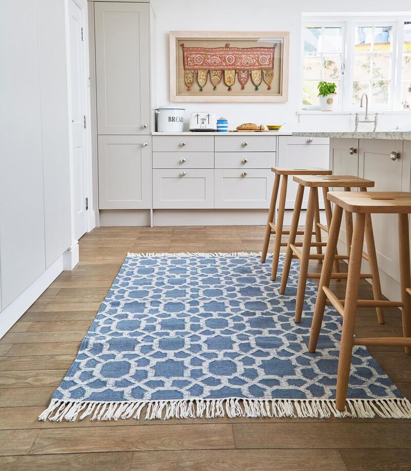 A rug by  Weaver Green