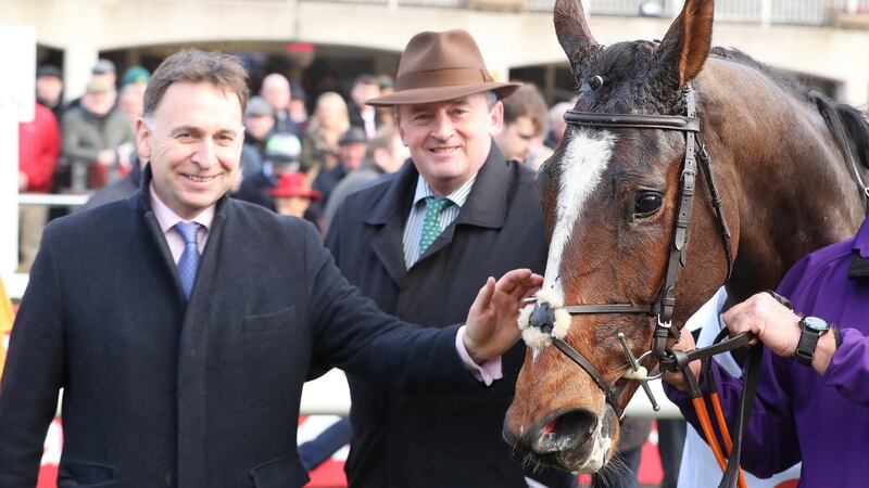 Notebook with trainer Henry de Bromhead and owner Eddie O’Leary in the parade ring after winning the Racing Post Novice Steeplechase during day one of the Christmas festival at Leopardstown. Photograph: Niall Carson/PA Wire
