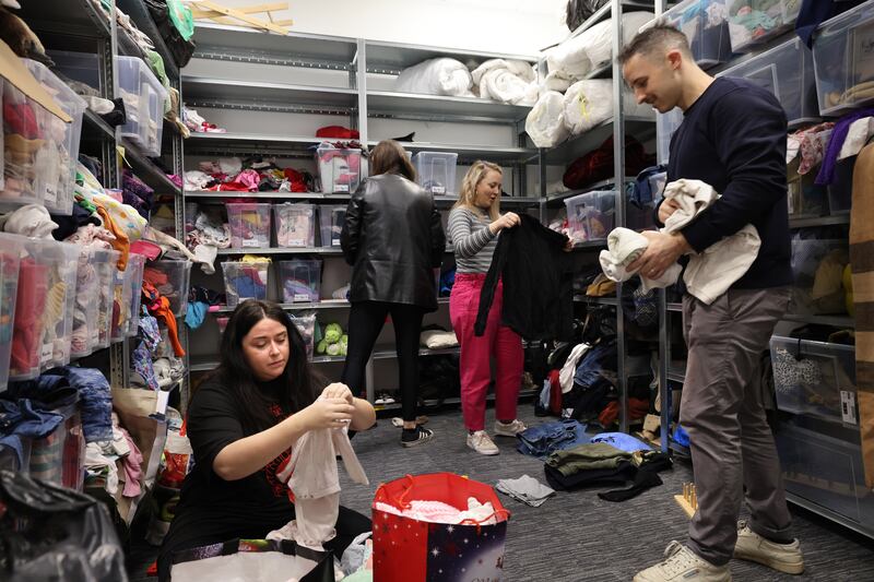 East Wall Here For All volunteers sort through some donated items for asylum seekers. Photograph: Dara Mac Dónaill






