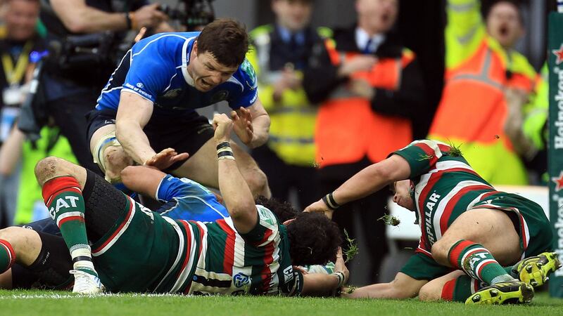 Leinster’s Brian O’Driscoll celebrates Isa Nacewa’s try during the 2011 Heineken Cup quarter-final against Leicester at the Aviva Stadium. Photograph: Dan Sheridan/Inpho