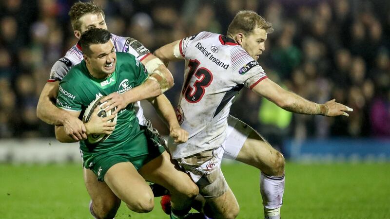 Stuart McCloskey (L) and Will Addison tackle Connacht’s Cian Kelleher. Photograph: Dan Sheridan/Inpho