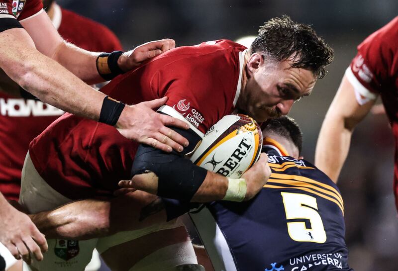 Lions number eight Jack Conan is tackled by Cadeyrn Neville of the Brumbies. Photograph: Billy Stickland/Inpho