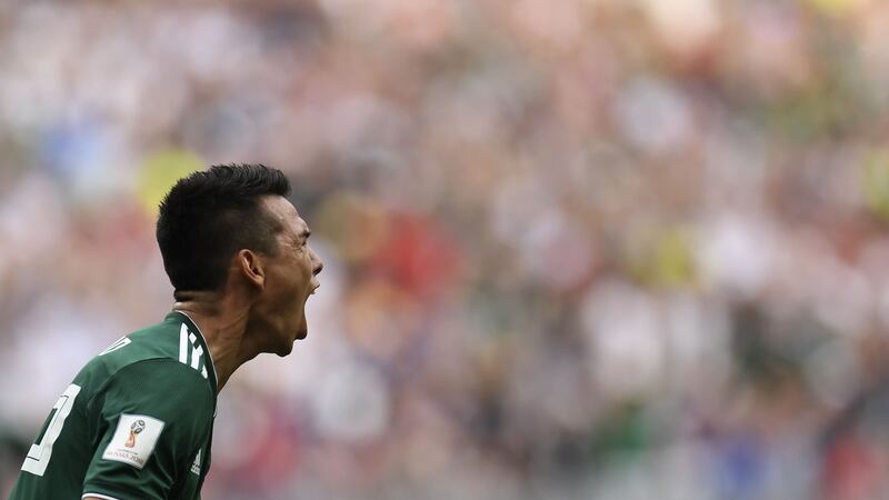 Mexico’s  Hirving Lozano celebrates after scoring his goal. Photograph: Patrik Stollarz/AFP/Getty Images