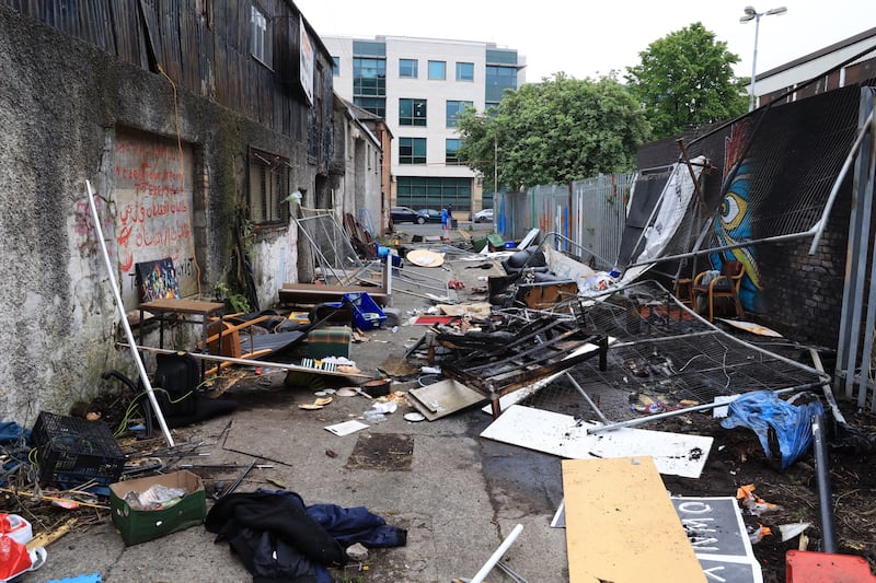 The scene of disturbances on Friday night at Dublin’s Sandwith Street Upper.  Dublin Fire Brigade and Gardai responded to a fire at the site of a makeshift refugee camp that had been the focus of angry protests.  Photo: Nick Bradshaw for The Irish Times