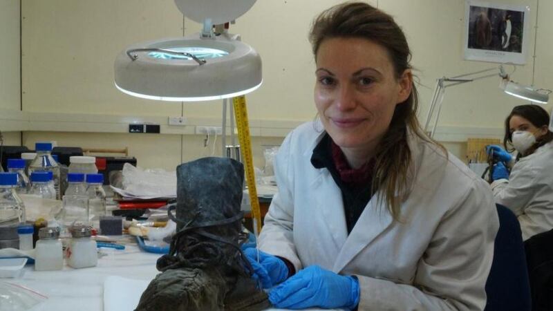 Leatherwork: Stefanie White conserving a historic boot from Scott’s hut in Cape Evans. Photograph: Sue Bassett