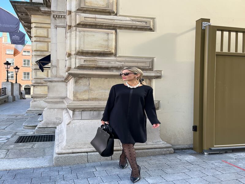 Black satin crepe Orion shift dress with contrasting satin sleeve detail €550. Available in colours