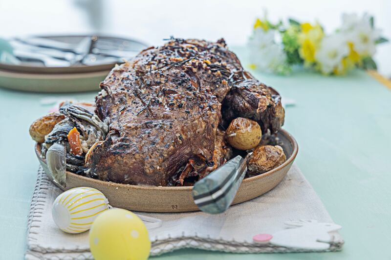 Wild garlic stuffed lamb shoulder, roast carrots and potatoes. Photograph: Harry Weir