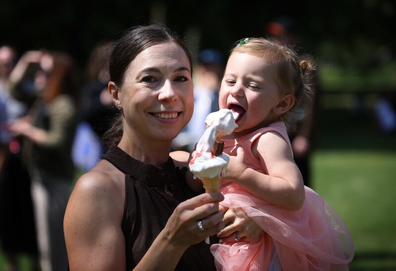 Lena Levins and her daughter Sofia (2) from Dublin enjoying the sunny weather in Merrion Square Dublin as the heat rises across the country. Photograph: Bryan O’Brien