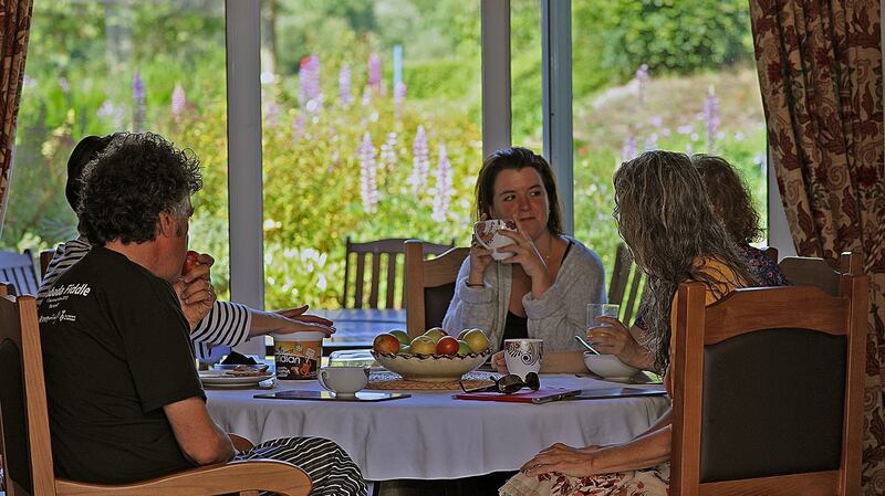 An artists’ discussion around the breakfast table at the Tyrone Guthrie Centre. Photograph: Lorraine Teevan, Tyrone Guthrie Centre