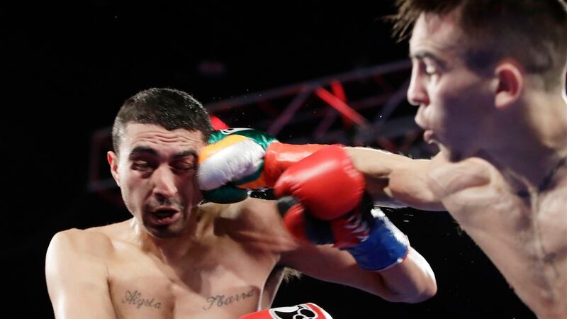 Conlan connects with a right hand to the face of Ibarra. Photo: Frank Franklin II/AP Photo