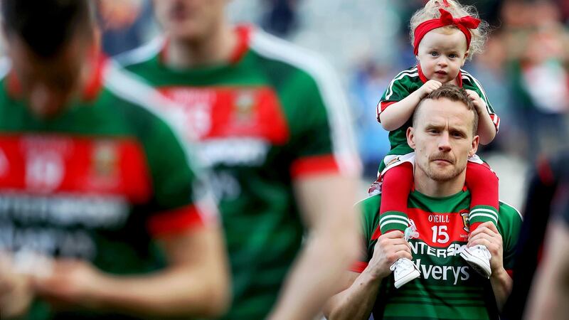 Mayo’s Andy Moran with his daughter Charlotte after losing the All-Ireland final by a point. Photograph: Tommy Dickson/Inpho