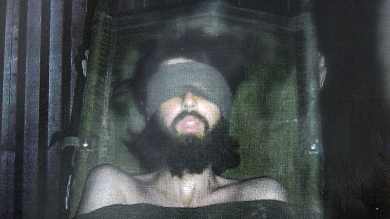 John Walker Lindh is shown in this undated photo bound to a stretcher after his capture by US troops at Camp Rhino in Khandahar, Afghanistan. Photograph: Getty Images