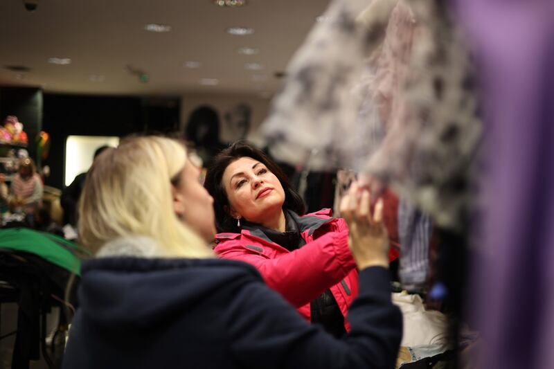 Svitlana Dovban helping Anastasia Suvikova, who arrived in Ireland on  March 18th. Photograph: Dara Mac Dónaill/The Irish Times