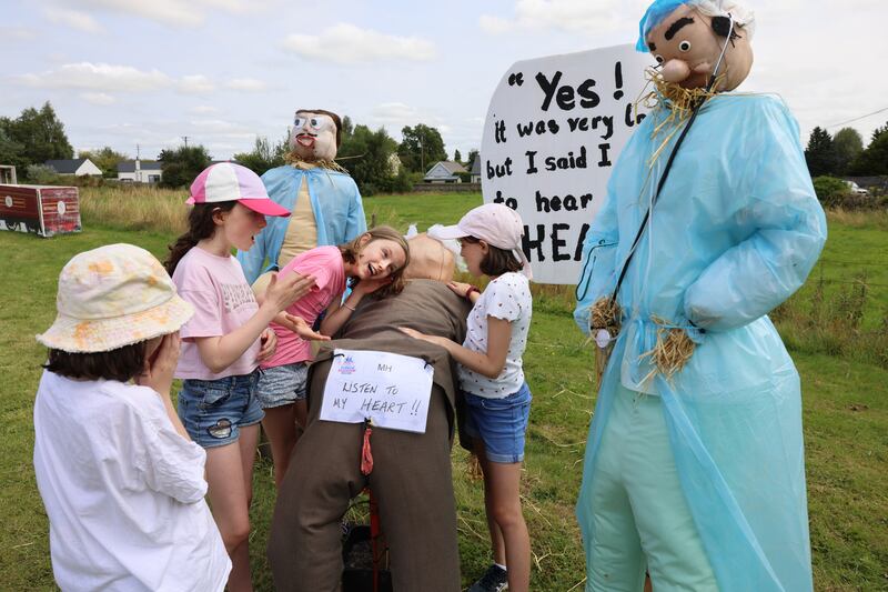 Sive O’Sullivan listens for a heartbeat, watched by Nina Gordon, Ruth O’Sullivan and Faye Gordon, all from Kilkenny. Photograph: Dara Mac Dónaill