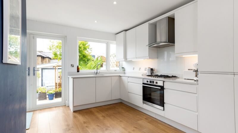 Kitchen opening to rear garden