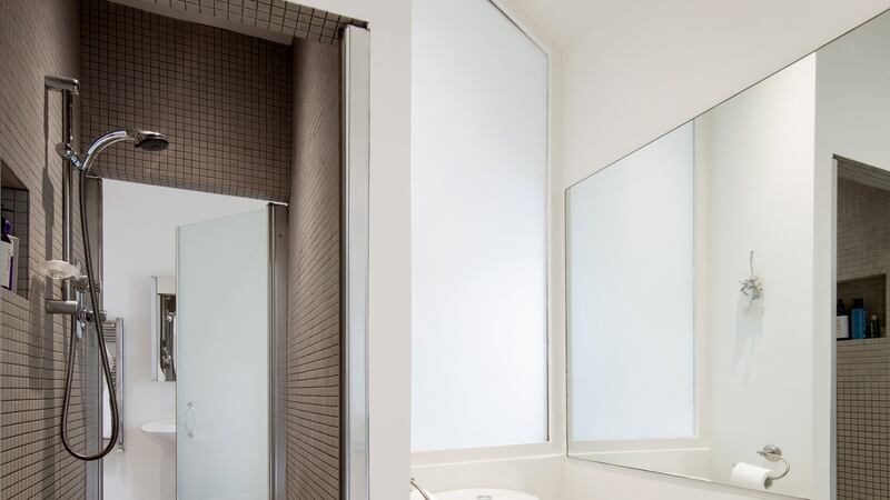 Bathroom with shower leading to en suite